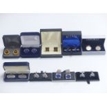 A collection of cufflinks including lapis lazuli, mother of pearl, cycling cufflinks etc.