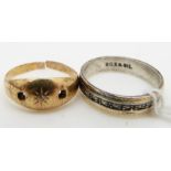 An 18ct gold ring (1.6g) and a 9ct gold and silver ring.