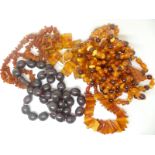 Two pressed amber bracelets, two amber necklaces and another necklace