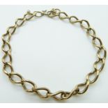 A 9ct gold curb link bracelet, 10.5g