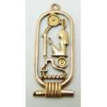 A yellow metal Egyptian pendant, 2.3g