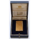 Dunhill 70 plated cigarette lighter with engine turned decoration, in original fitted case, 7cm