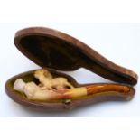 A carved miniature Meerschaum pipe with deer surmount, in original case, 9cm