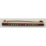 Edwardian brooch set with square cut rubies and seed pearls