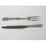 Continental white metal handled carving knife and fork, the floral embossed handles marked 800