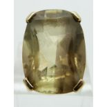 A 9ct gold ring set with a smoky quartz