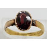 Victorian 22ct gold ring set with an oval cut garnet, size L