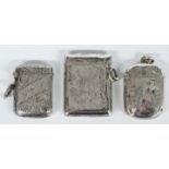 Three Victorian and later hallmarked silver vesta cases, Chester 1901, Birmingham 1910 and