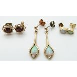A pair of 9ct gold earrings set with opals and cubic zirconia, a pair of 9ct gold earrings set