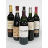 Six bottles of red wine including Chateau Angaut 1996, Carta Roja Monastrell 2001, Castillo de