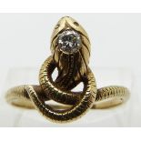 A 14ct gold ring set with a round cut diamond of approximately 0.18ct in a snake setting, size P