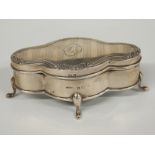 George V hallmarked silver quatrefoil shaped footed trinket or jewellery box with pleated silk