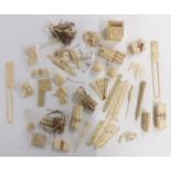 A collection of mostly Chinese 19thC carved ivory pieces, puzzles pieces, fan parts, panels etc