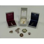 Four silver necklaces, a Wedgwood pendant, a silver brooch, a silver ring and a West Highland