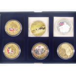 Six gold plated crown coins 2014 commemorating the beginning of the First World War, some with