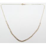 A 9ct gold necklace with tri-coloured plaited design, 1.8g