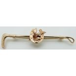 A 9ct gold brooch in the form of a crop and horseshoe, maker H.G & S