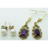 A pair of 9ct gold earrings set with amethysts and a pair of pearl earrings