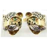 A pair of 18ct gold earrings in the form of leopards, set with emerald eyes, enamel and diamonds