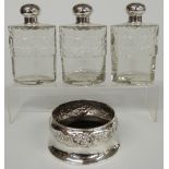 Edward VII hallmarked silver three bottle table flask set, each bottle with cut glass upper body,