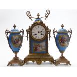 Brunfaut French porcelain and gilt metal clock garniture, each piece marked Brunfaut, clock movement