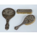 Hallmarked silver mounted Reynold's Angels hand mirror and brush and a further silver mounted brush