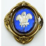 Victorian pinchbeck brooch set with a plaque depicting the Prince of Wales' heraldic badge