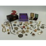 A collection of costume jewellery including brooches, pendants including brooch, agate pendants,