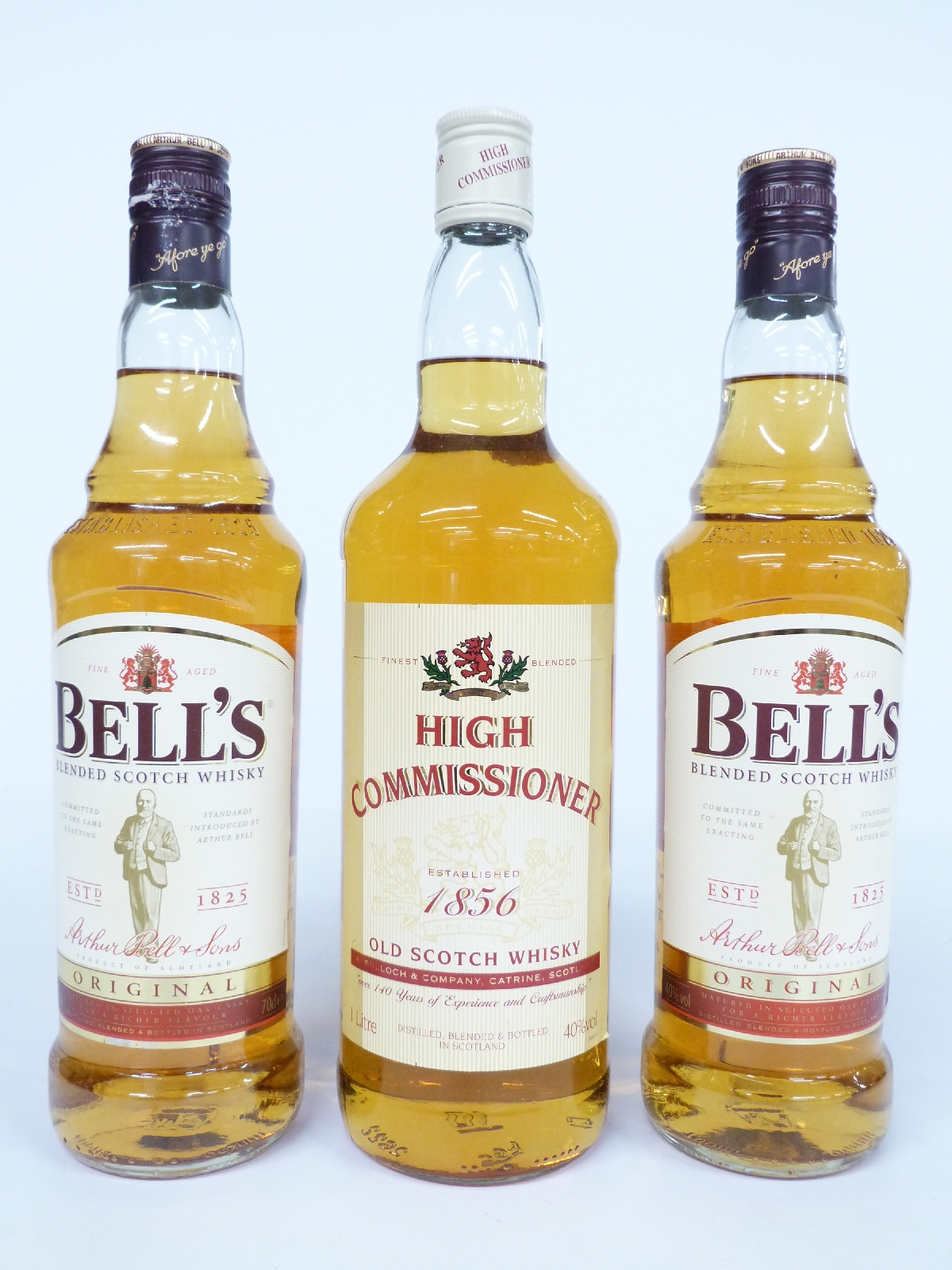 Three bottles of blended scotch whisky comprising two bottles of Bell's 40% vol, 70cl and a bottle