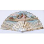 A mother of pearl fan with pierced and gilt decoration and painted scenes, in original velvet