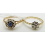 A 9ct gold ring set with a sapphire cabochon and faux pearls in a cluster and a 9ct gold ring set