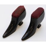 Pair of Victorian/Edwardian ebonised treen pin cushions in the form of ladies shoes, 5cm.