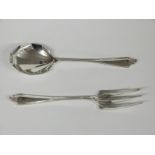 A pair of George V hallmarked silver salad servers with geometric Art Deco design to the bowl/tines,