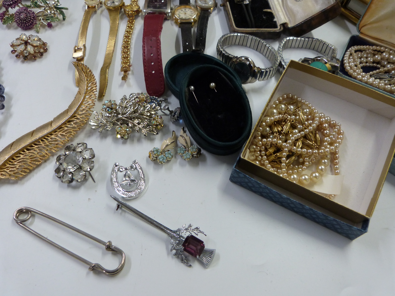 A collection of costume jewellery including large enamel brooches, marcasite, watch, necklaces, - Image 9 of 13