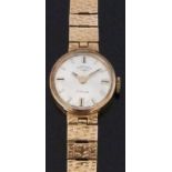 Rotary 9ct gold ladies wristwatch ref. B601 with two-tone hands and markers, silver dial and