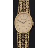 Tissot Saphir 18ct gold ladies wristwatch with black hands, two-tone baton markers, gold face and