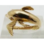 A 14ct gold ring in the form of a dolphin, 2.9g, size L
