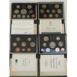 Royal Mint deluxe cased brilliant uncirculated coin sets comprising 1989, 1994, 1996 and 1997,