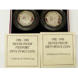A cased pair of silver proof Piedfort 50 pence coins, 1992 and 1993