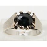 An 18ct white gold ring set with a sapphire, size I