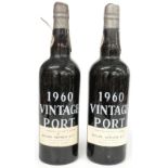 Two bottles of Butler Nephew & Co 1960 vintage port.