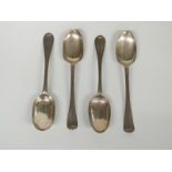 A set of four Queen Anne hallmarked silver rat tail tablespoons, marks rubbed but likely London 1709