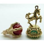 Two 9ct gold charms, one a claw set with an agate sphere, and a fob depicting a horse jumping a gate