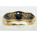 Edwardian 18ct gold ring set with three round cut sapphires and two diamonds, Chester 1907, in