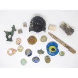 A quantity of ancient Roman and near Eastern artefacts, amulets including head, bronze ibex,