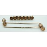 Victorian brooch set with chrysoberyl and two matching stick pins