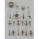 A quantity of hallmarked silver teaspoons including a set of six, hallmarked silver spoon and a