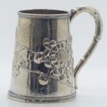 Chinese silver tankard with chrysanthemum and foliate decoration, faux bamboo handle and impressed