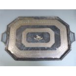 A large silver plated twin handled octagonal tray with engraved decoration, length 70.5cm