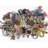 A collection of costume jewellery including necklaces, watches, brooches etc